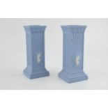 Wedgwood Dancing Hours square column candlesticks, 15cm tall (2). In good condition with no