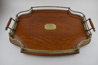 Golden oak tea-tray with silver-plated rail and handles. Sitting on original ball feet. Silver-