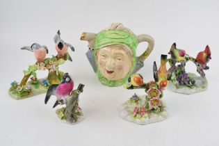 Pottery to include a trio of Royal Adderley birds, a Crown Staffs bird and an unmarked double