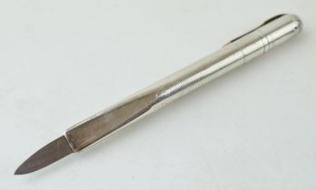 Sterling silver retractable letter opener in the form of a pen, 12cm long, working action.