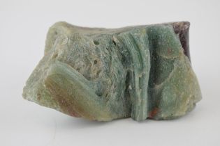 A specimen of volcanic glass / fluorite in green and purple. Dimensions 13cm x 7cm x 8cm. Weight 556