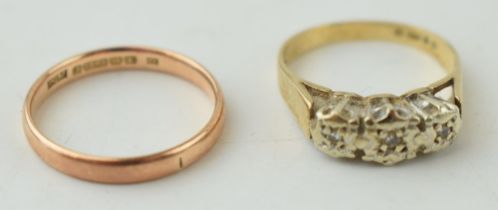 Two 9ct yellow gold rings to include a wedding band (size M) together with a yellow gold and diamond