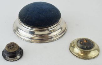 Three hat pin holders to include a silver example, hallmarked Birmingham 1984 with blue velvet