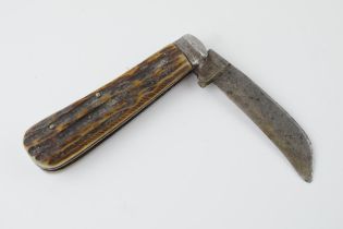 An antique bone handle pruner pocket knife, no makers marks visible. blade 8cm, Total length 18.5cm.