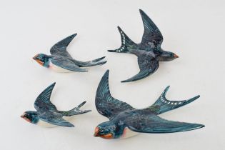 Beswick swallow wall plaques to include 757-1, 2 x 757-2 and a 757-3 (4 - all with damages). Display