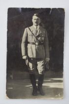 An original WWII era postcard of Adolf Hitler marked to reverse Echo Photographie. Approx 8.5cm x