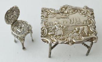 Victorian embossed silver miniature table Birmingham 1896 with associated chair, 27.6 grams (2).