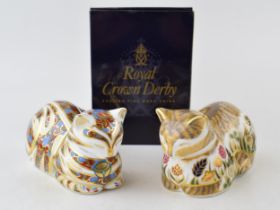 Two Royal Crown Derby Cat paperweights, Cottage Garden Cat, 21st anniversary special gold stopper,