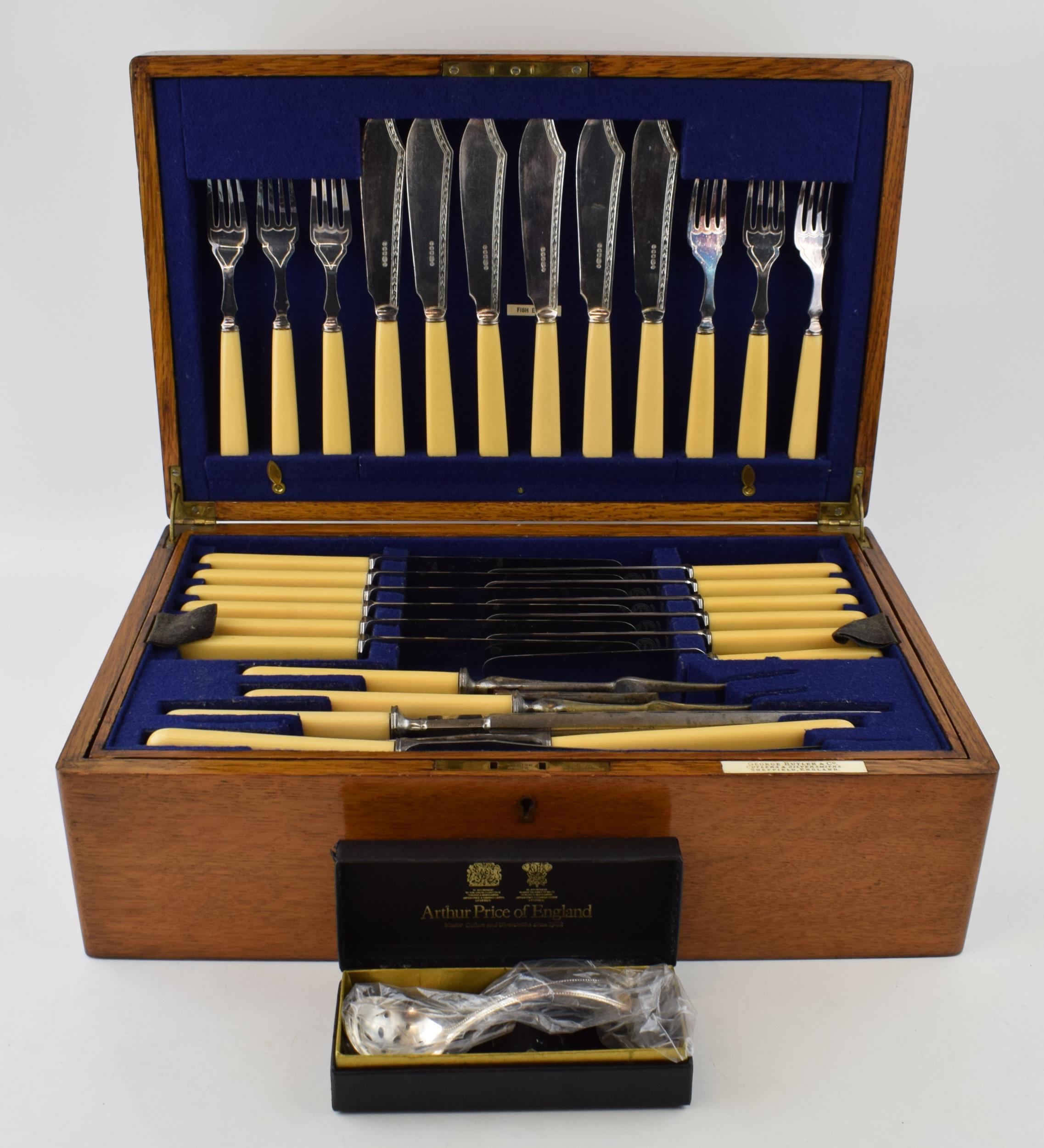 A silver-plated cutlery service in a golden oak canteen by George Butler & Co Sheffield.