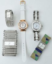 A collection of ladies fashion watches to include examples by manufacturers D&G (2), Versus,
