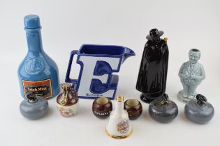 Advertising wares to include a Wade Worthingtons jug, a Sandeman decanter, a Polycrol advertising