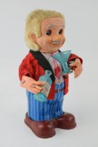 Vintage 'Blushing Willy' c1960s Japan Tin Toy, Battery Operated Litho Printed. Height 17cm. In