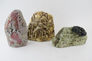 A collection of oriental stone effect carvings, largest 25Cm tall. In good original condition.