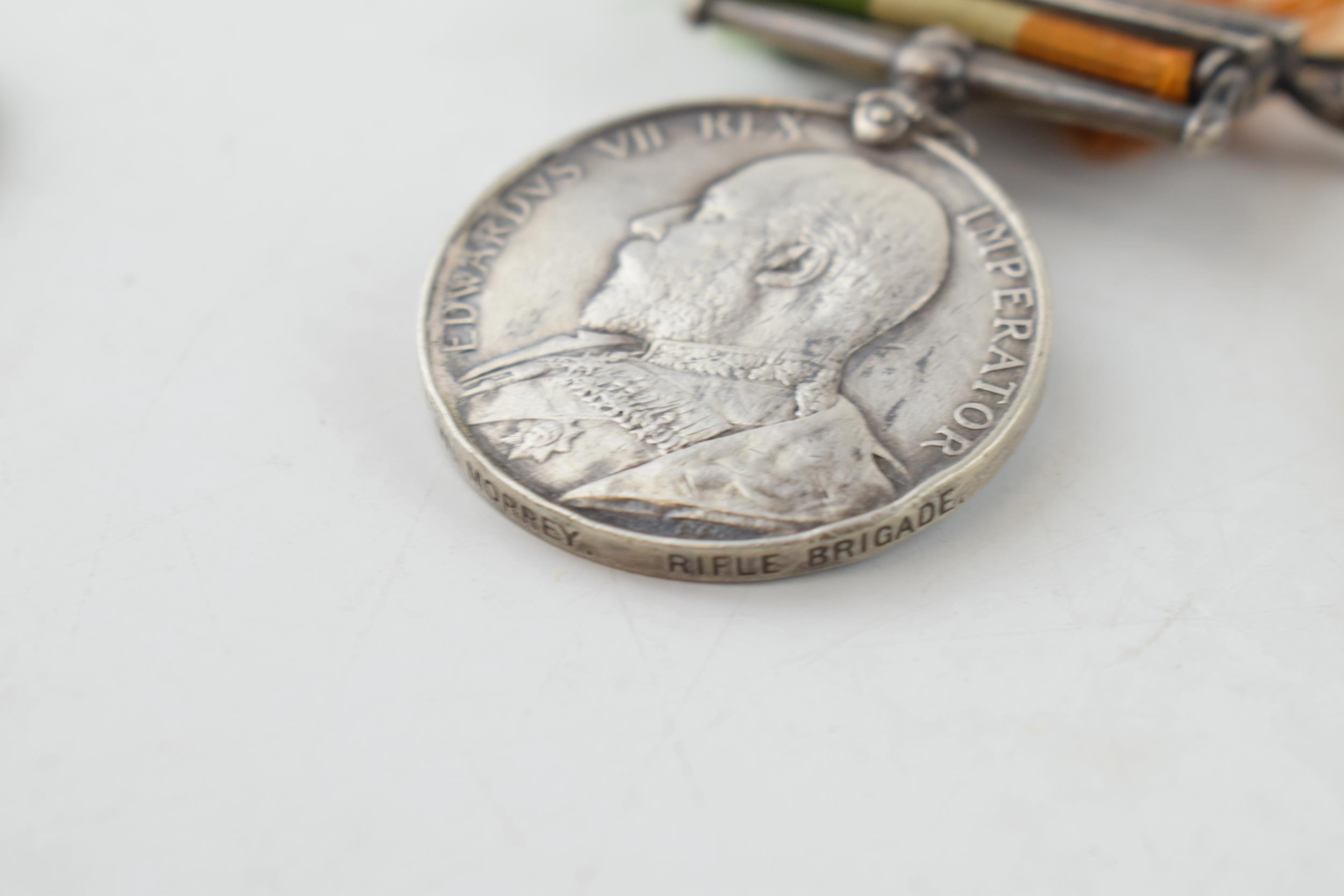 A trio of medals awarded to 7977 Pte W. Morrey Rifle Brigade, South Africa Medal Queen Victoria, - Image 6 of 8