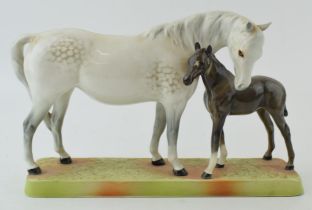 Beswick Horse and Foal in grey and brown colourway 1811. In good condition with no obvious damage or