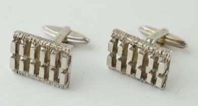 A pair of sterling silver cufflinks with textured design, 14.4 grams (2).