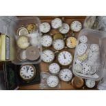 A large collection of antique and vintage pocket watches, movements and dials together with a velvet