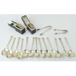 A collection of silver spoons. Hallmarked Birmingham. Together with two boxed napkin rings and two