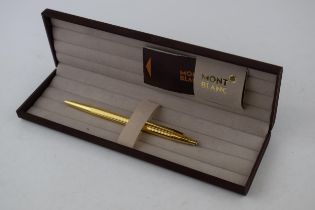 Montblanc Gold Tone Ballpoint Pen, in excellent condition, in original box, guarantee, writing.