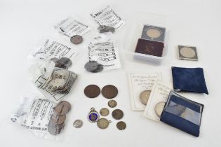 A collection of pre-1920 defaced silver coins, circa 25 grams, to include enamelled coins and
