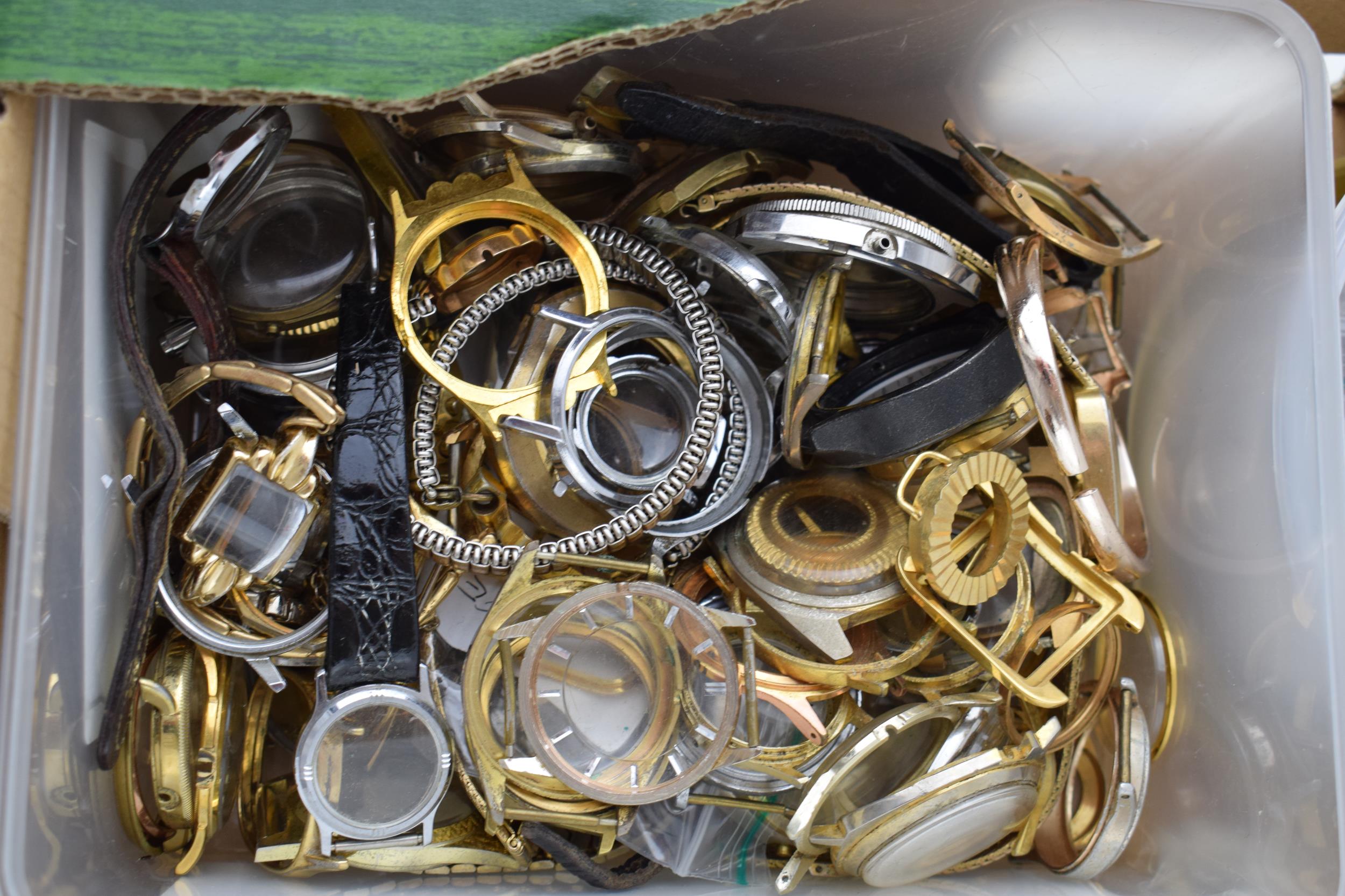 A large collection of watch parts to include bezels, quartz movements, watch backs and links. A good - Image 4 of 8