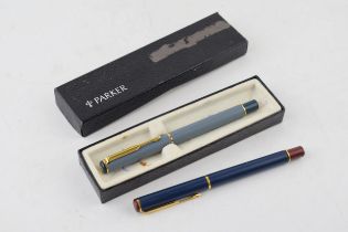 A pair of Parker 95 pens, one ball point and the other a fountain, box, both working (2).