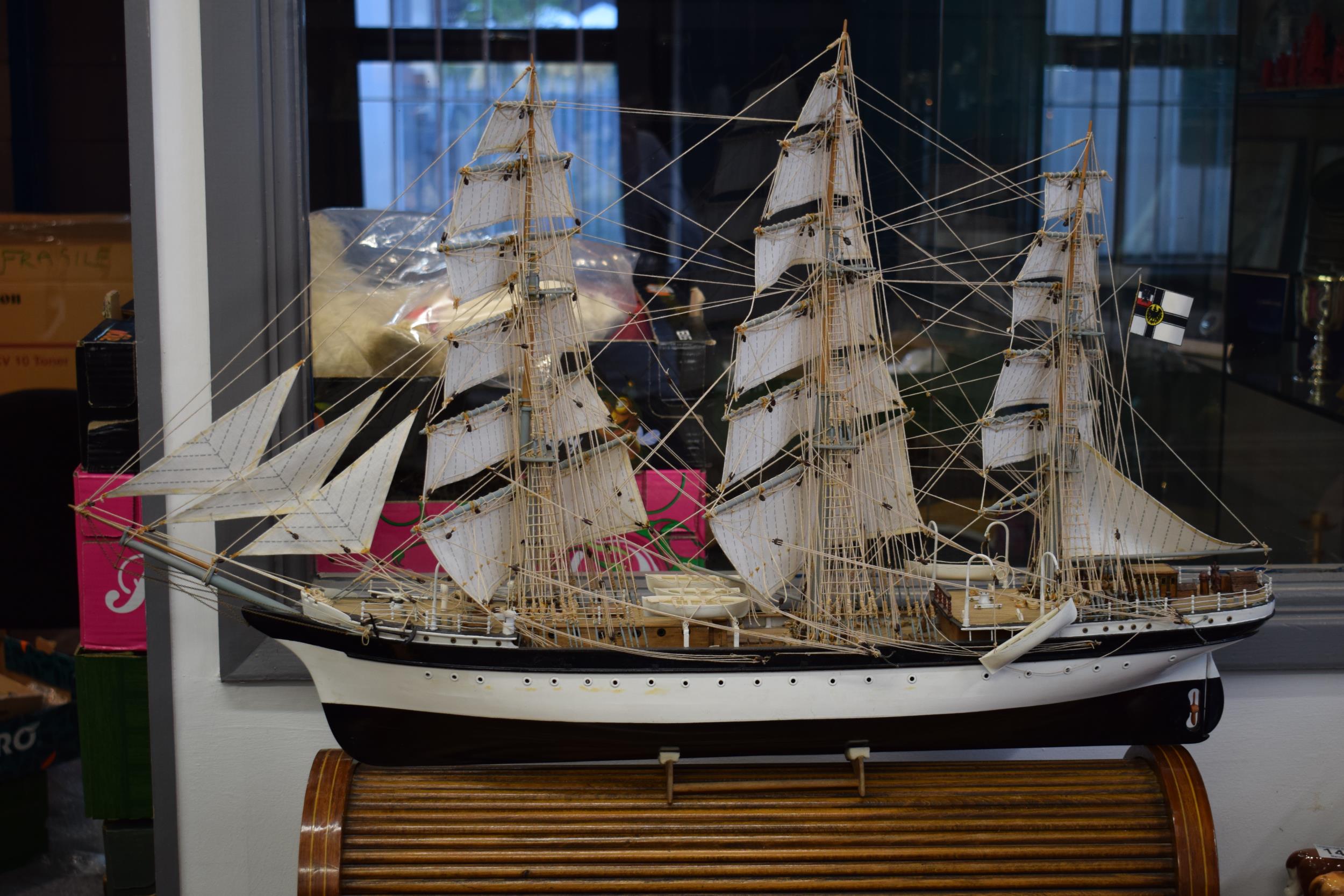 Kit built model of a sailing vessel / galleon, with German flag, mounted onto wooden stand, mostly