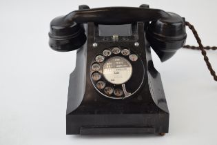 Vintage black Bakelite telephone with Leek dial code to centre, unconverted.