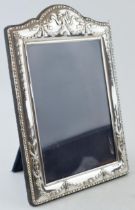 Silver ornate photo frame with ribbon and bow decoration, 24.5cm tall, easel-back, Sheffield 1996.