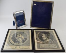 A pair of silver plated photo frames, tallest 26cm tall, with a pair of French fashion prints /