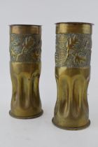 A pair of Trench Art German shells dated 1914 and 1917 Patronenfabrik Karlsruhe with stylised oak