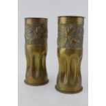 A pair of Trench Art German shells dated 1914 and 1917 Patronenfabrik Karlsruhe with stylised oak