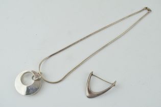 Two items of Danish and Scandanvian style silver and white metal jewellery to include a brooch