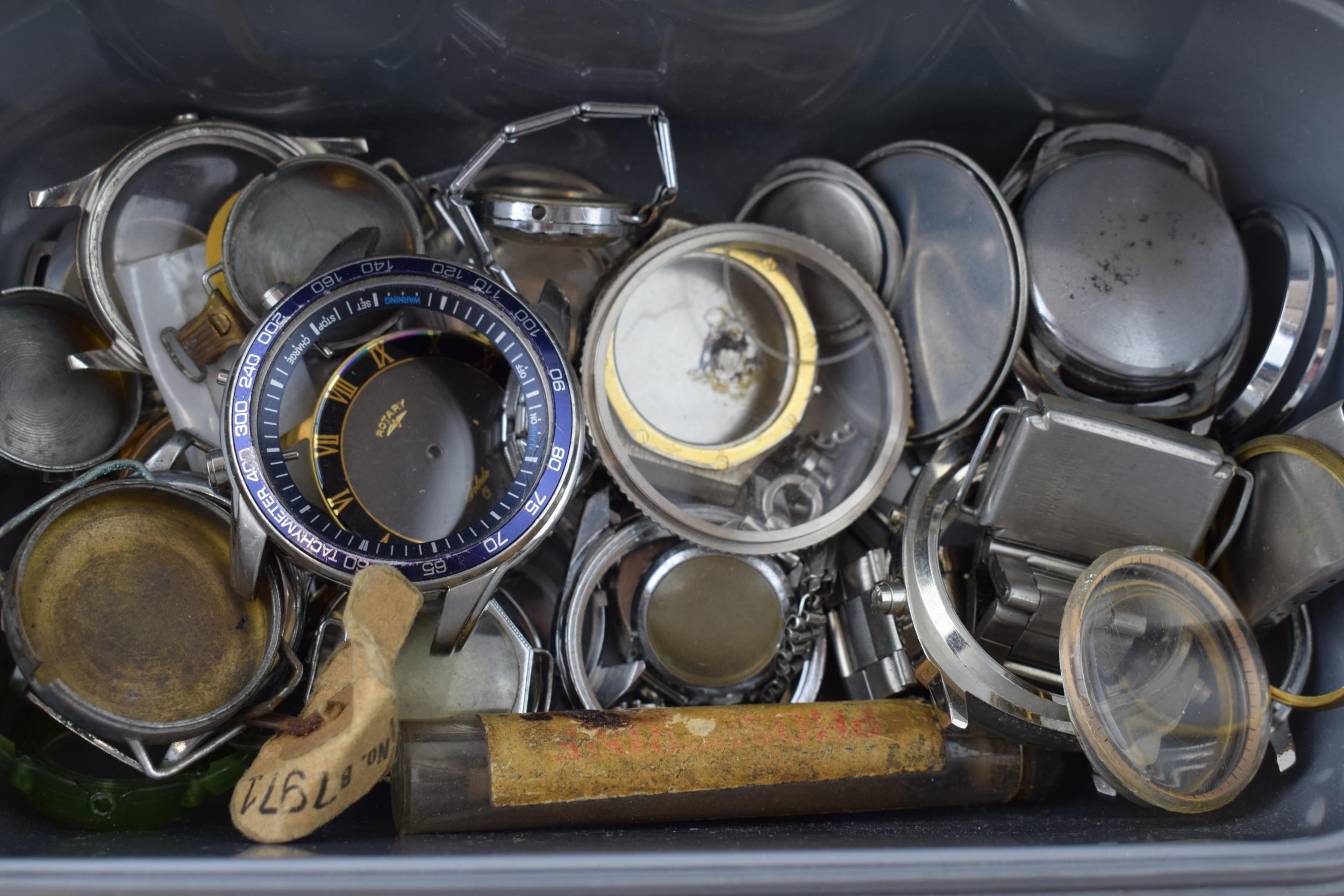 A large collection of watch parts to include bezels, quartz movements, watch backs and links. A good - Image 5 of 8