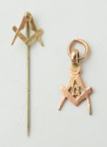 A 9ct gold masonic pendant, 1.0 grams, with a 9ct gold masonic stick pin, metal pin, 0.5 grams (2).