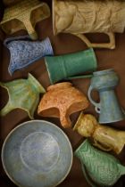 A collection of Wade and Wadeheath Flaxman pottery items and similar to include baskets, an embossed