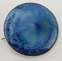 A Ruskin blue enamel circular brooch in plain silver mount, impressed mark for 'Ruskin' to verso,