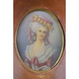 A framed and signed miniature of a lady, maybe signed 'Watton', 16 x 14cm.