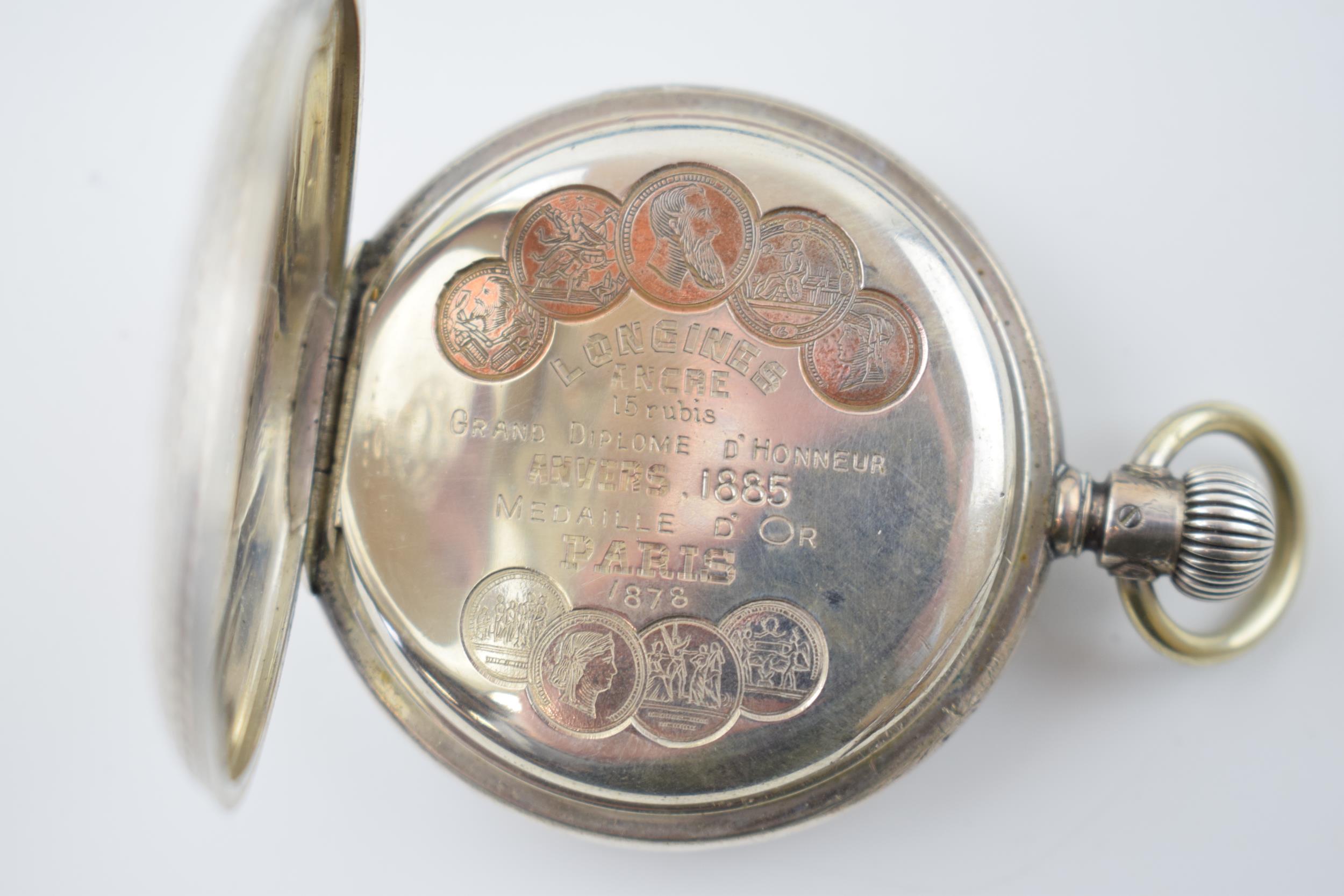 Longines silver full hunter pocket watch marked .800 to inner case. White ceramic dial with Roman - Image 7 of 9