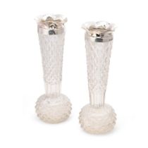 A large pair of cut glass vases with silver rims, Birm 1899, William Hutton and Sons, 25cm tall (2).