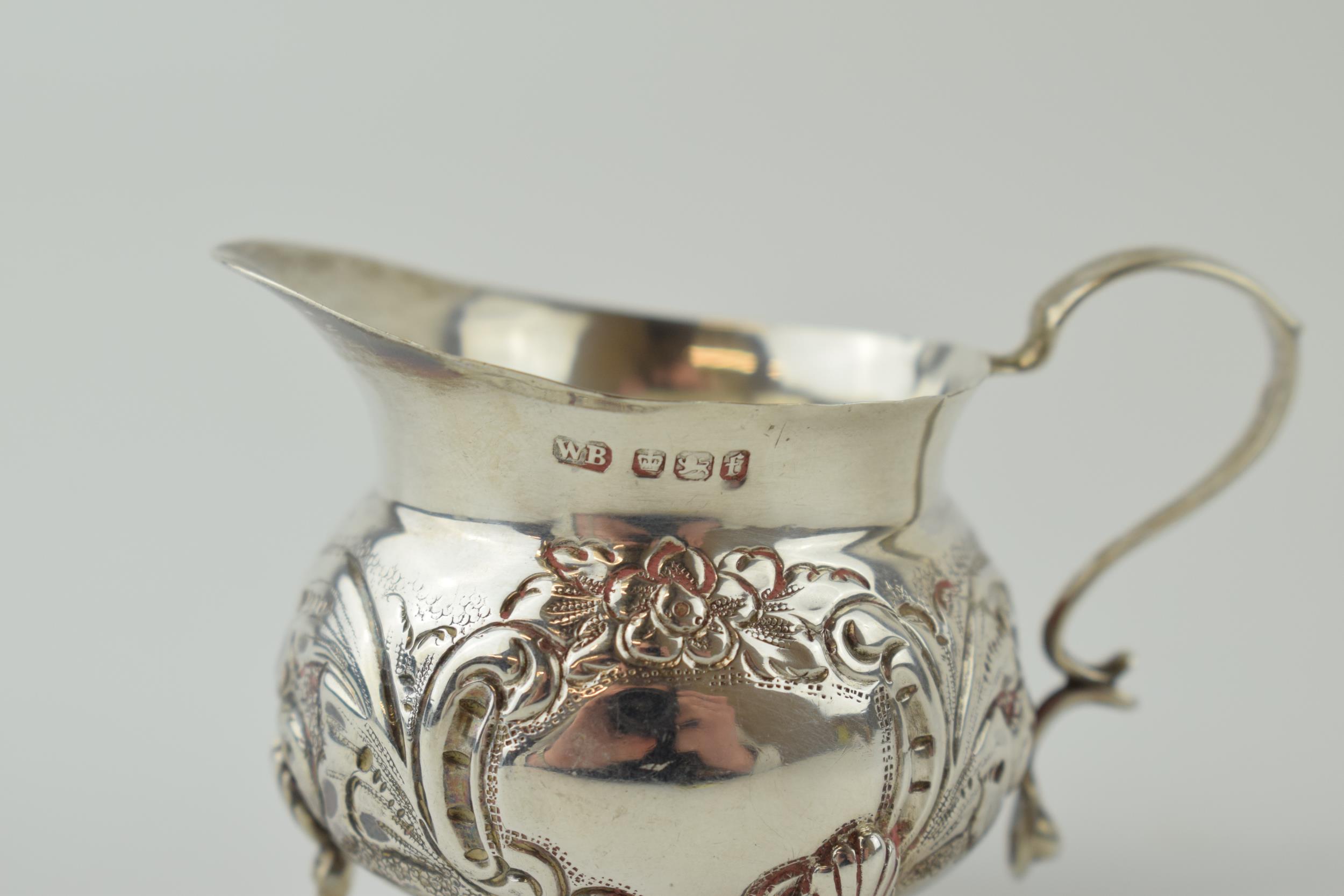 Silver embossed small jug, claw feet, Sheffield 1898, 58.6 grams, 8cm wide. - Image 2 of 2