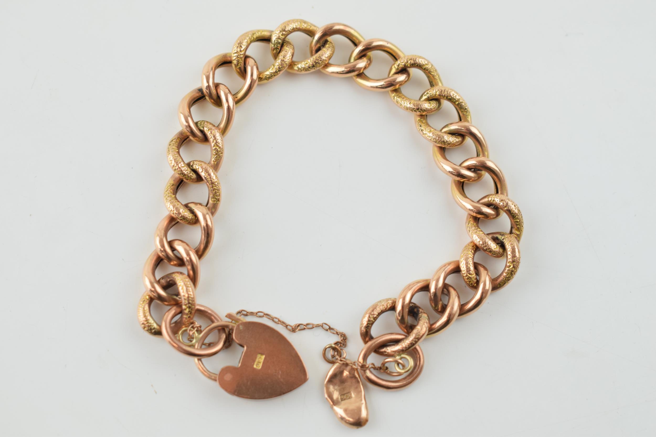 A 9ct yellow gold bracelet with heart shaped padlock. weight 19.4 grams In good original condition. - Image 2 of 4