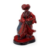 Royal Doulton Flambe figure The Lamp Seller HN3278. In good condition with no obvious damage or