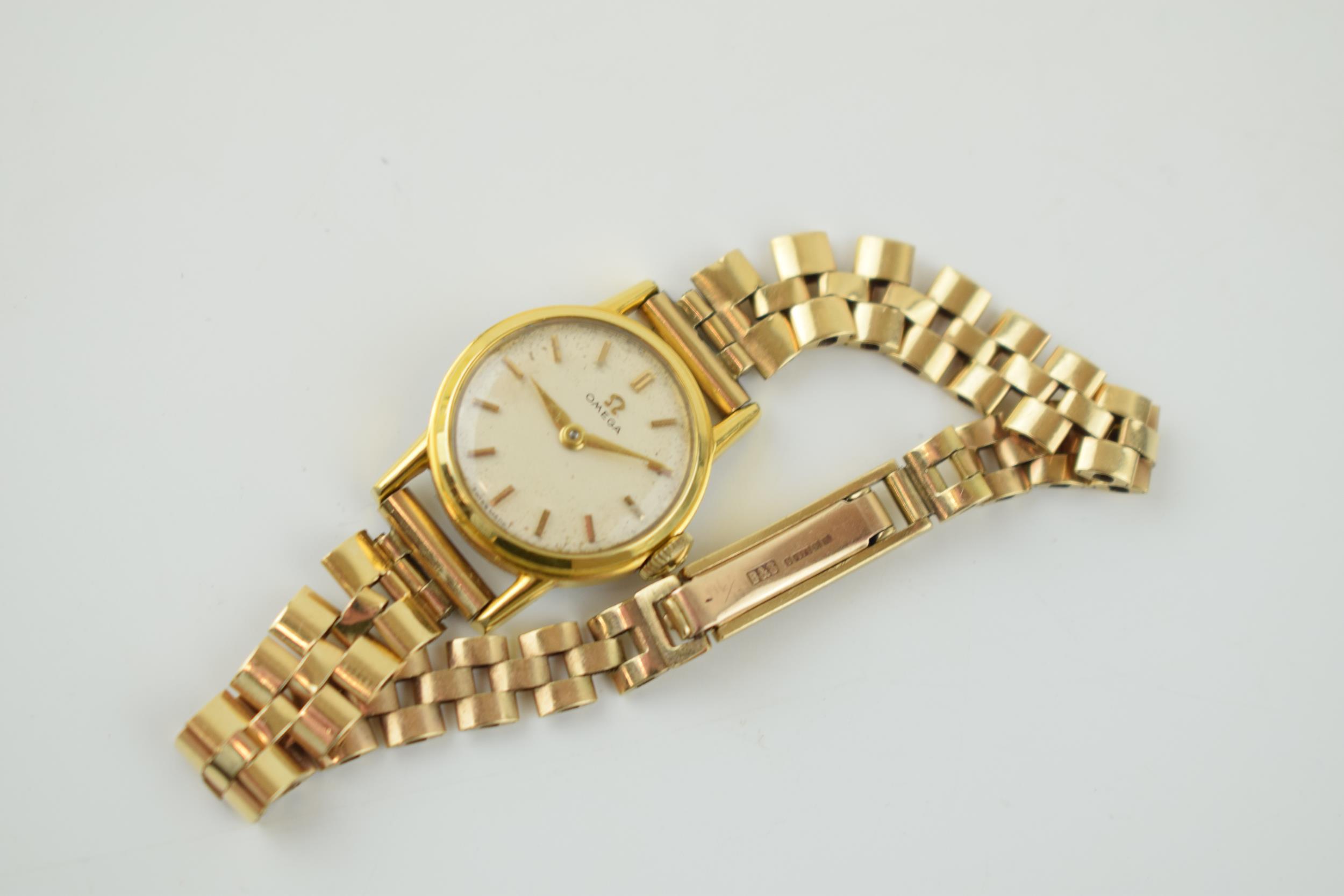 Omega ladies manual wristwatch, 19mm, in gold plated case, on 9ct gold strap, gross weight 17.0 - Image 2 of 4