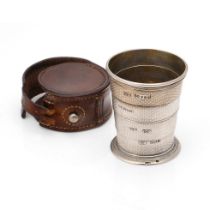 Victorian silver collapsible cup, vacant cartouche, and with engine turned decoration, in original