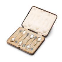 A stunning cased set of hallmarked silver tea spoons with enamelled decoration in the form of