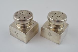 A pair of silver pepper / pounce pot, 65.4 grams, stamped to base 'Cartier Sterling 425 Reproduction