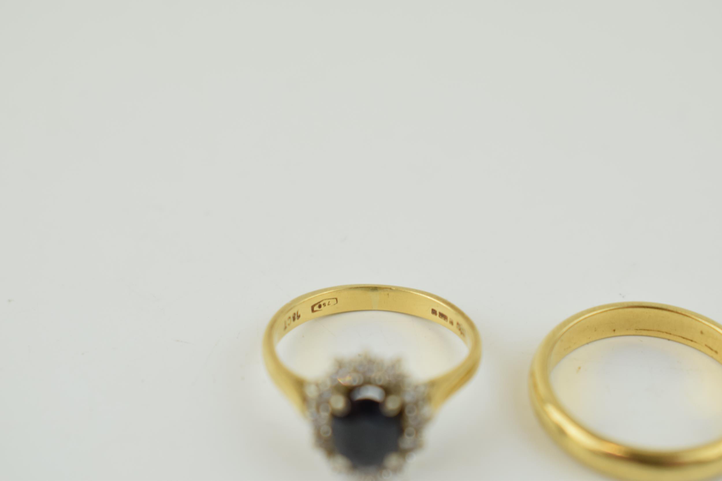 An 18ct yellow gold wedding band, 3.6 grams, size K, with an 18ct gold sapphire and diamond - Image 3 of 4