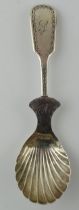 Victorian silver caddy spoon, London 1870, elongated handle, 20.8 grams, 13cm tall. Repair to