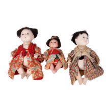Trio of antique Japanese dolls. Composite heads with cork limbs to include father, mother and child.